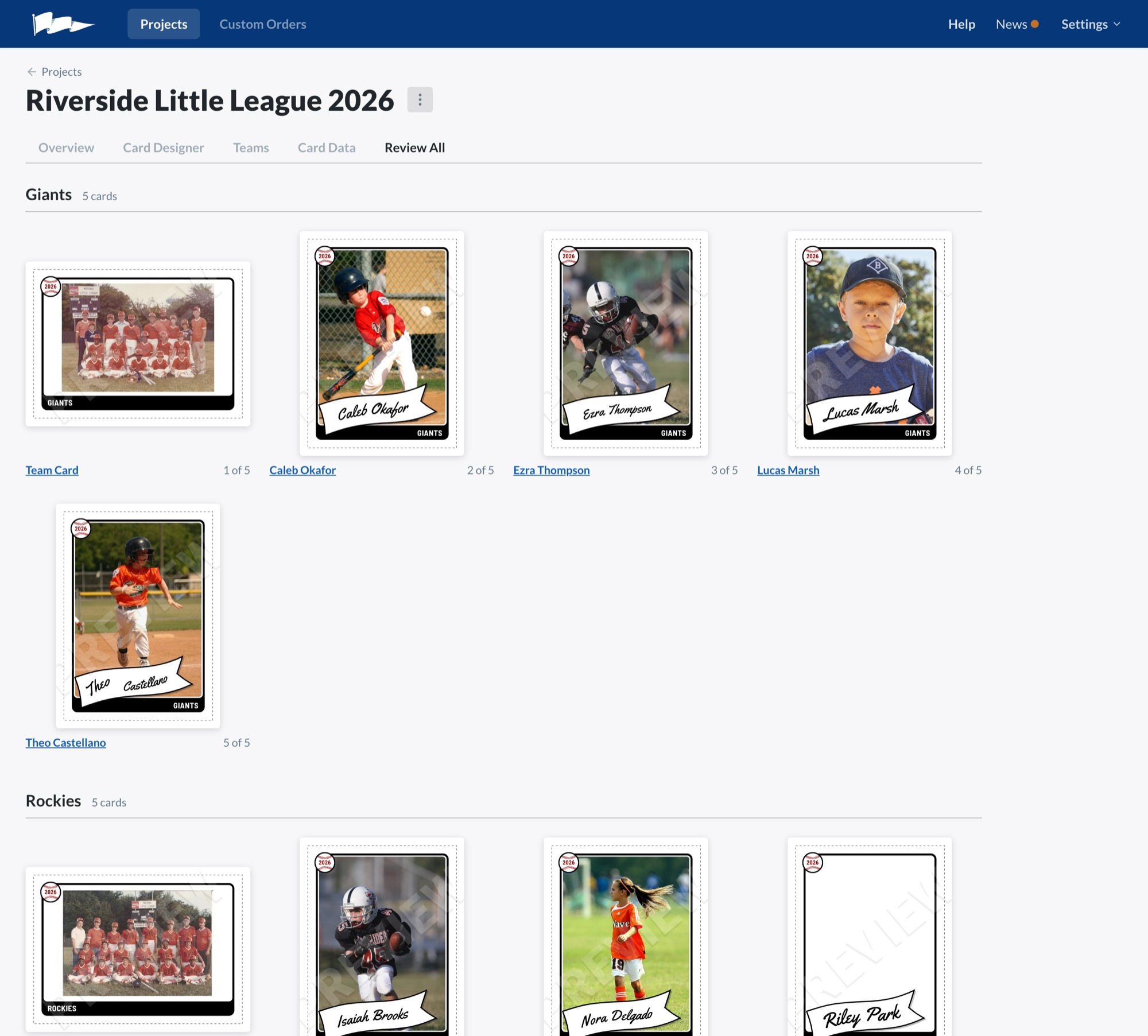 The Review All tab showing every card grouped by team, including one card still missing its headshot